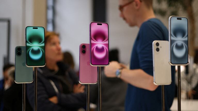 Apple iPhone 16 smartphones are displayed at a store in London, Britain, October 6, 2024. REUTERS/Hollie Adams