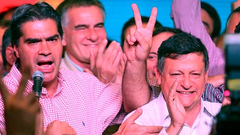 Capitanich festeja con su delfín y nuevo gobernador, Domingo Peppo.