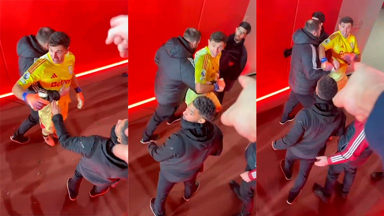 Dibu Martínez fue contenido para evitar que se vaya a las manos.