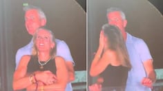 El momento en que ambos descubren que estaban en la pantalla gigante del estadio.