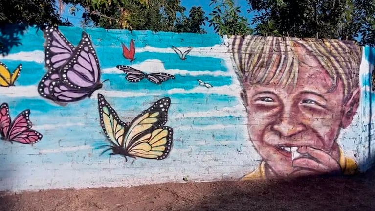 El mural de Lucio en una de las paredes del jardín de infantes.