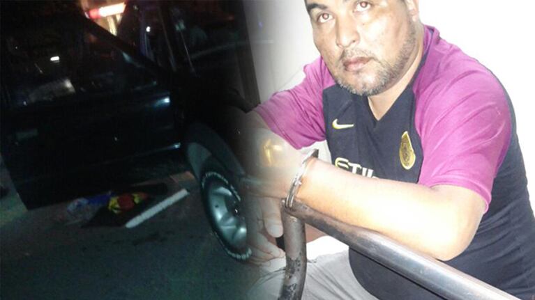 El subconisario Ariel Barrionuevo, esposado tras ser detenido junto a otros delincuentes.