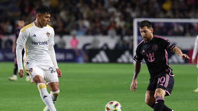 Feb 25, 2024; Carson, California, USA; Inter Miami CF forward Lionel Messi (10) plays the ball against the LA Galaxy during the second half at Dignity Health Sports Park. Mandatory Credit: Kiyoshi Mio-USA TODAY Sports