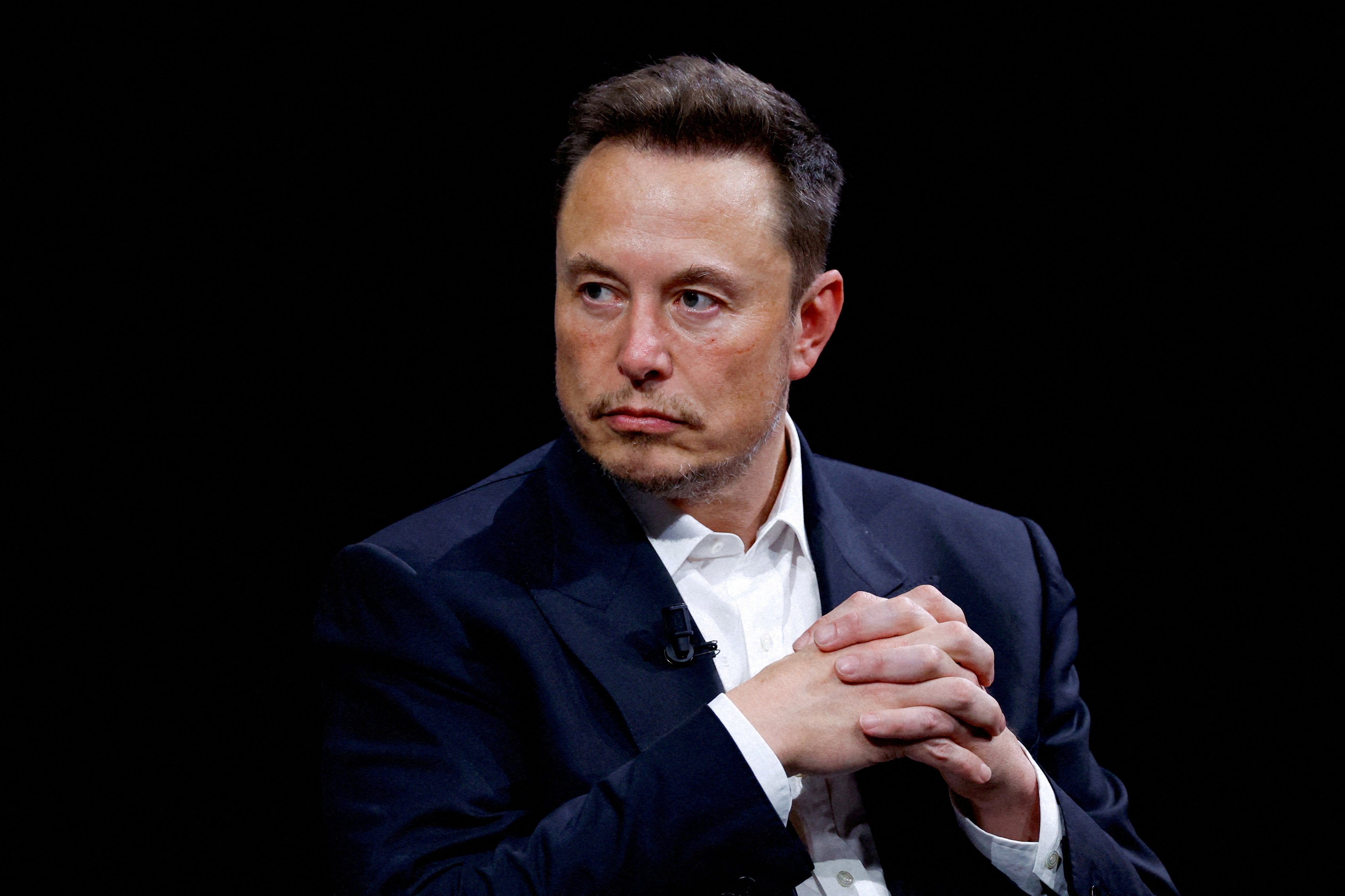 FILE PHOTO: Elon Musk, CEO of SpaceX and Tesla and owner of X, formerly known as Twitter, attends the Viva Technology conference dedicated to innovation and startups at the Porte de Versailles exhibition centre in Paris, France, June 16, 2023. REUTERS/Gonzalo Fuentes/File Photo