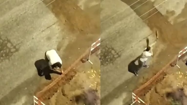 Filmaron a un vecino tapando un bache en avenida Vélez Sársfield.