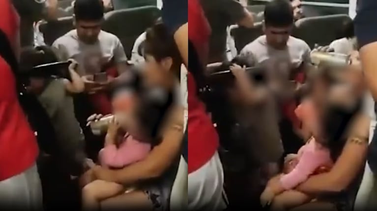 Grabaron a una mujer dándole cerveza a un bebé.