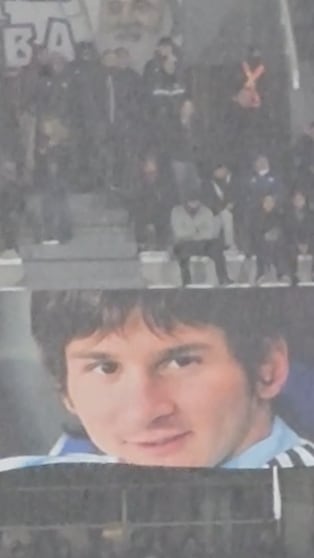 La bandera de los hinchas de Talleres a Messi