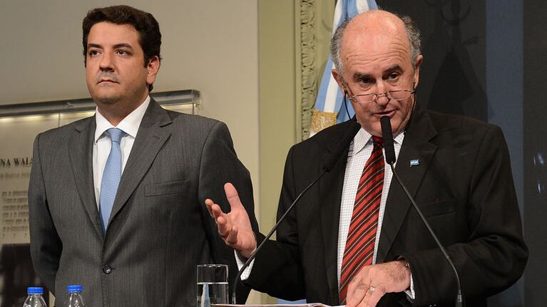 Juan Martín Mena y Oscar Parrilli.