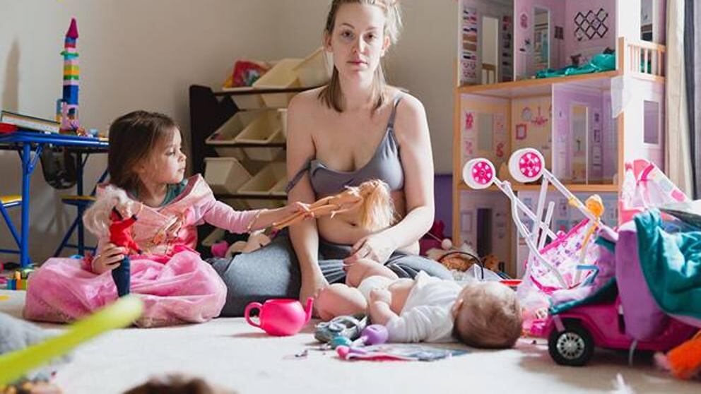 La foto de Kathy y sus niños, mostrando la cara más difícil de un tema difícil de aceptar.