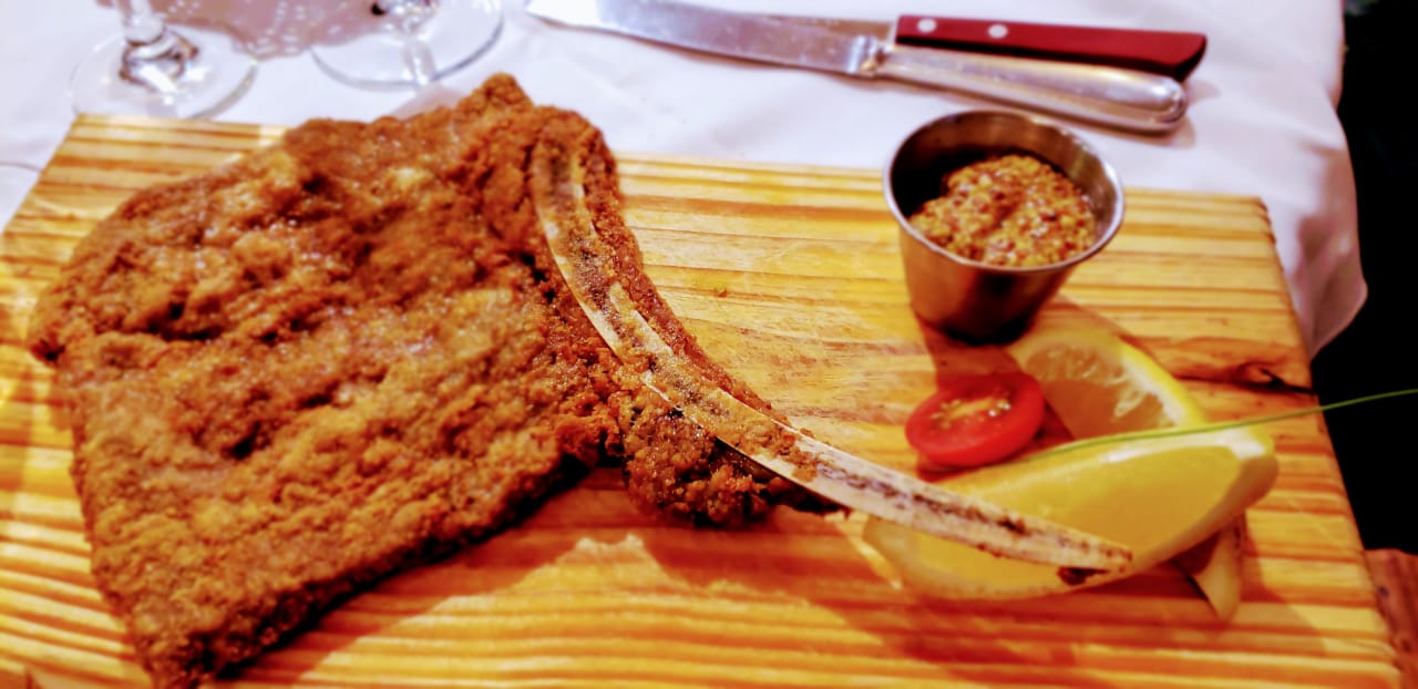 La milanesa se destacó en el menú de la servilleta.