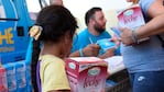 Las familias deben retirar la leche con la libreta azul.