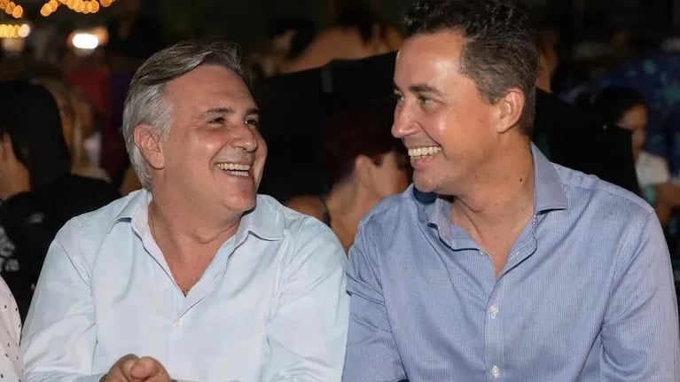 Llaryora, junto a Manuel Calvo.