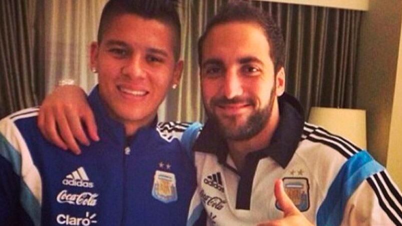 Marcos Rojo y Gonzalo Higuain disfrutaron de la noche del sábado.