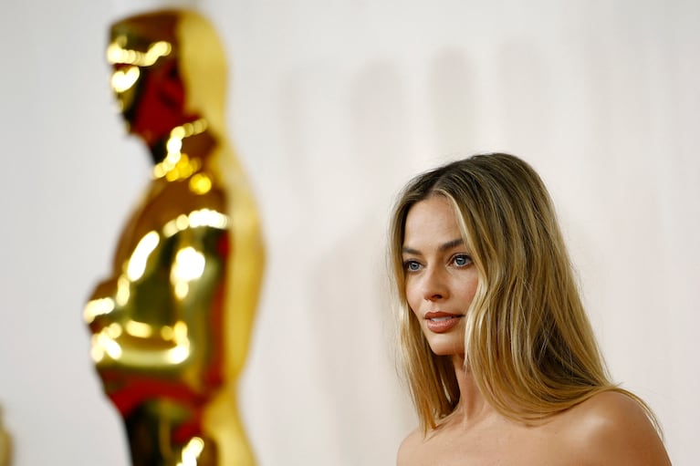 Margot Robbie poses on the red carpet during the Oscars arrivals at the 96th Academy Awards in Hollywood, Los Angeles, California, U.S., March 10, 2024. REUTERS/Sarah Meyssonnier