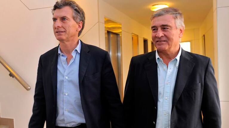 Mauricio Macri y Oscar Aguad, cuestionados por la Justicia.