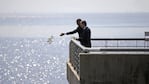 Obama, junto a Macri, arrojó flores al Río de la Plata.