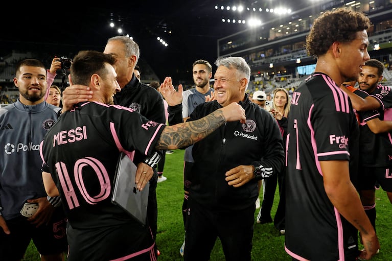 Oct 2, 2024; Columbus, Ohio, USA; Inter Miami CF forward Lionel Messi (10) celebrates with head coach Gerardo Martino after the game against the Columbus Crew at Lower.com Field. Mandatory Credit: Trevor Ruszkowski-Imagn Images