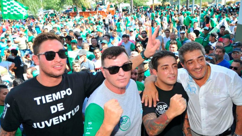 Pascual Catrambone y su hijo Agustín, junto a Mauricio y Franco Saillén.