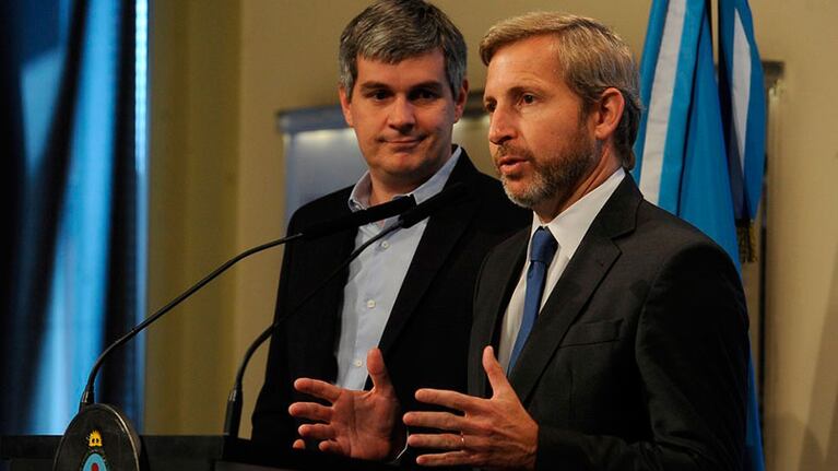 Peña y Frigerio, protagonistas de las intensas reuniones por el impuesto.