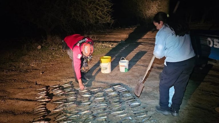 Pesca furtiva en dique La Viña.