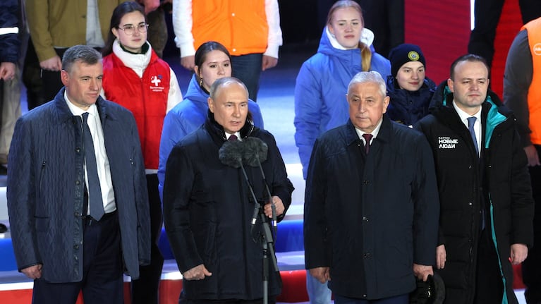 Russian incumbent President Vladimir Putin, who was declared winner of the presidential election by the country's electoral commission, and defeated candidates Nikolai Kharitonov, Vladislav Davankov and Leonid Slutsky attend a rally, which marks the 10th anniversary of Russia's annexation of Crimea from Ukraine, in Red Square in central Moscow, Russia, March 18, 2024. Sputnik/Gavriil Grigorov/Kremlin via REUTERS ATTENTION EDITORS - THIS IMAGE WAS PROVIDED BY A THIRD PARTY.