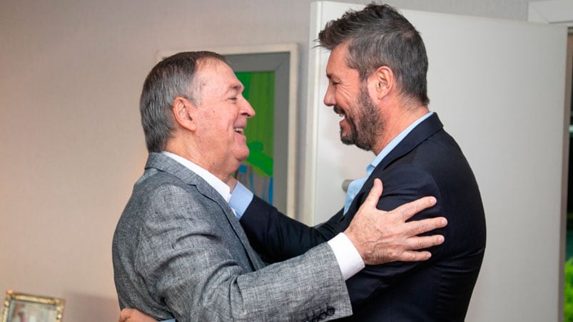 Schiaretti y Tinelli, en una reunión repleta de sonrisas. 