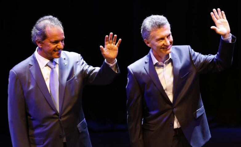 Scioli y Macri: sólo uno festejará el domingo. 