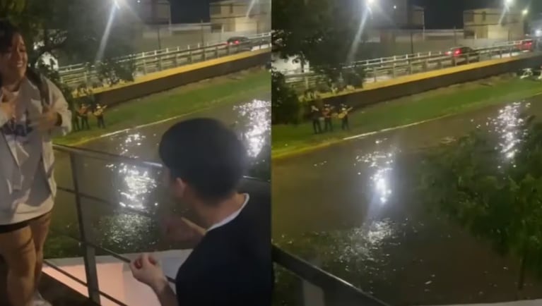 Se podía escuchar a un grupo de mariachis que tocaban una serenata aunque la calle estaba inundada.