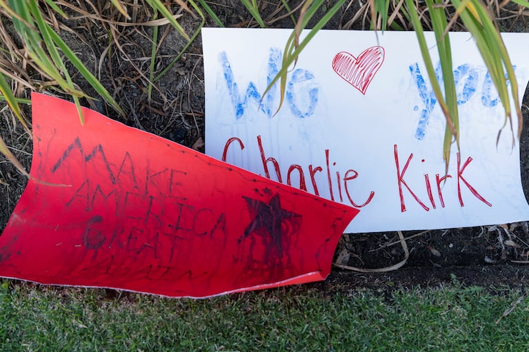 Sheets of paper commemorating Charlie Kirk lie on the ground at a makeshift memorial for U.S. right-wing activist, commentator, Charlie Kirk, an ally of U.S. President Donald Trump, who was fatally shot during an event at Utah Valley University, outside of Timpanogos Regional Hospital, in Orem, Utah, U.S. September 11, 2025. REUTERS/Cheney Orr
