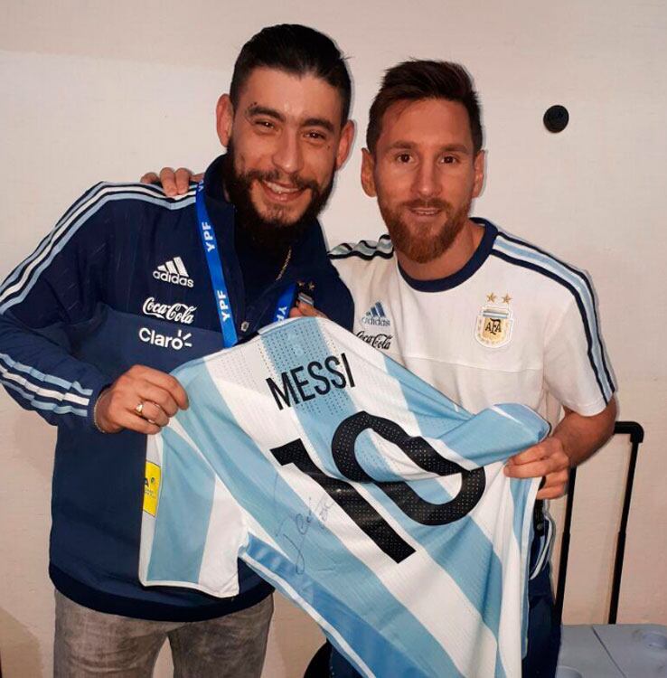 Ulises Bueno y Lionel Messi